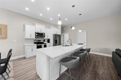 Waterfront Pool Home SW Cape Coral! This newer construction home on Palmetto-Pine Country Club in Florida - for sale on GolfHomes.com, golf home, golf lot