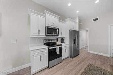 Waterfront Pool Home SW Cape Coral! This newer construction home on Palmetto-Pine Country Club in Florida - for sale on GolfHomes.com, golf home, golf lot