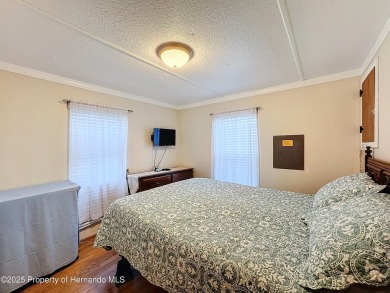SNOWBIRDS OR HOMEOWNERS WELCOME- YOU OWN the land. 2 Bedroom on Glen Lakes Country Club in Florida - for sale on GolfHomes.com, golf home, golf lot