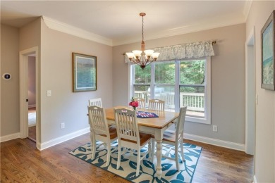 PRICE IMPROVEMENT - WATERFRONT RETREAT - located in the Lake on The Highlands Course at Lake Arrowhead in Georgia - for sale on GolfHomes.com, golf home, golf lot