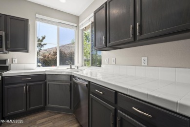 Welcome home to the serene mountain and wetland views in Heron's on Rosewood Lakes Golf Course in Nevada - for sale on GolfHomes.com, golf home, golf lot
