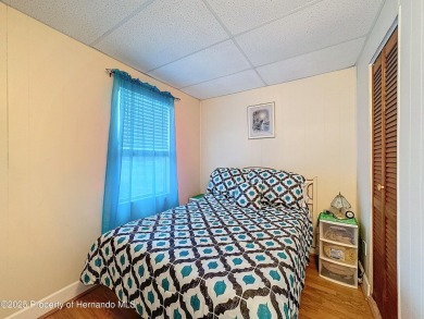 SNOWBIRDS OR HOMEOWNERS WELCOME- YOU OWN the land. 2 Bedroom on Glen Lakes Country Club in Florida - for sale on GolfHomes.com, golf home, golf lot