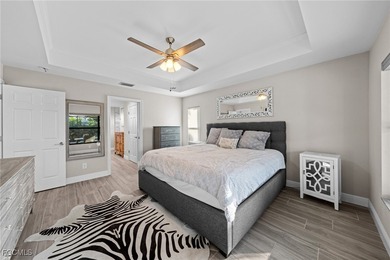 Waterfront Pool Home SW Cape Coral! This newer construction home on Palmetto-Pine Country Club in Florida - for sale on GolfHomes.com, golf home, golf lot