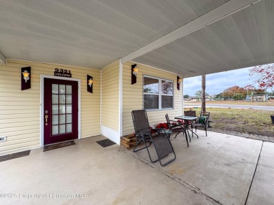 SNOWBIRDS OR HOMEOWNERS WELCOME- YOU OWN the land. 2 Bedroom on Glen Lakes Country Club in Florida - for sale on GolfHomes.com, golf home, golf lot