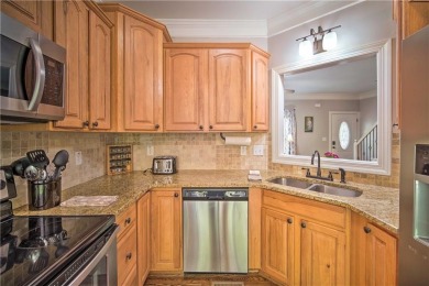 PRICE IMPROVEMENT - WATERFRONT RETREAT - located in the Lake on The Highlands Course at Lake Arrowhead in Georgia - for sale on GolfHomes.com, golf home, golf lot