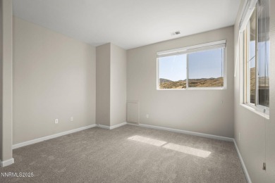 Welcome home to the serene mountain and wetland views in Heron's on Rosewood Lakes Golf Course in Nevada - for sale on GolfHomes.com, golf home, golf lot