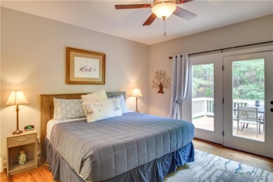 PRICE IMPROVEMENT - WATERFRONT RETREAT - located in the Lake on The Highlands Course at Lake Arrowhead in Georgia - for sale on GolfHomes.com, golf home, golf lot