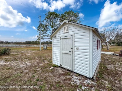 SNOWBIRDS OR HOMEOWNERS WELCOME- YOU OWN the land. 2 Bedroom on Glen Lakes Country Club in Florida - for sale on GolfHomes.com, golf home, golf lot