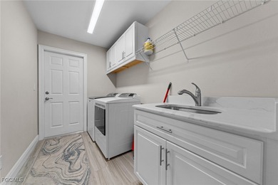 Waterfront Pool Home SW Cape Coral! This newer construction home on Palmetto-Pine Country Club in Florida - for sale on GolfHomes.com, golf home, golf lot