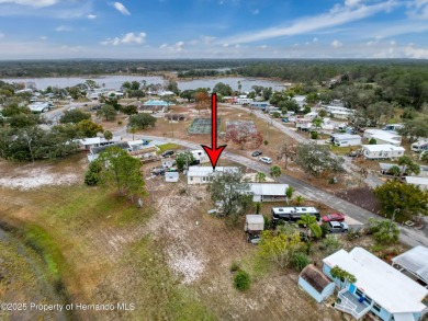 SNOWBIRDS OR HOMEOWNERS WELCOME- YOU OWN the land. 2 Bedroom on Glen Lakes Country Club in Florida - for sale on GolfHomes.com, golf home, golf lot