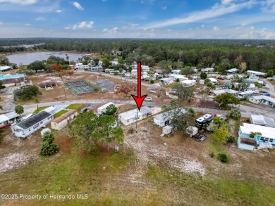 SNOWBIRDS OR HOMEOWNERS WELCOME- YOU OWN the land. 2 Bedroom on Glen Lakes Country Club in Florida - for sale on GolfHomes.com, golf home, golf lot