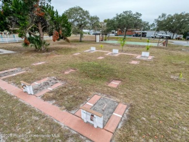 SNOWBIRDS OR HOMEOWNERS WELCOME- YOU OWN the land. 2 Bedroom on Glen Lakes Country Club in Florida - for sale on GolfHomes.com, golf home, golf lot