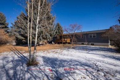 Welcome to your ideal home in the heart of Cody, Wyoming! This on Olive Glenn Golf and Country Club in Wyoming - for sale on GolfHomes.com, golf home, golf lot