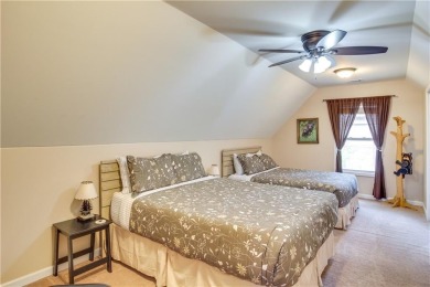 PRICE IMPROVEMENT - WATERFRONT RETREAT - located in the Lake on The Highlands Course at Lake Arrowhead in Georgia - for sale on GolfHomes.com, golf home, golf lot