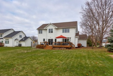 Nestled in the heart of eastern Waukee, this two-story on Des Moines Golf and Country Club in Iowa - for sale on GolfHomes.com, golf home, golf lot