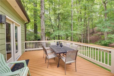 PRICE IMPROVEMENT - WATERFRONT RETREAT - located in the Lake on The Highlands Course at Lake Arrowhead in Georgia - for sale on GolfHomes.com, golf home, golf lot