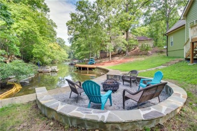 PRICE IMPROVEMENT - WATERFRONT RETREAT - located in the Lake on The Highlands Course at Lake Arrowhead in Georgia - for sale on GolfHomes.com, golf home, golf lot