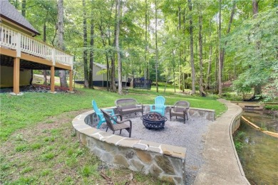 PRICE IMPROVEMENT - WATERFRONT RETREAT - located in the Lake on The Highlands Course at Lake Arrowhead in Georgia - for sale on GolfHomes.com, golf home, golf lot