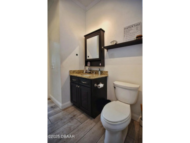 Welcome to 1948 Spruce Creek Landing--an exclusive estate in the on Spruce Creek Golf Club in Florida - for sale on GolfHomes.com, golf home, golf lot