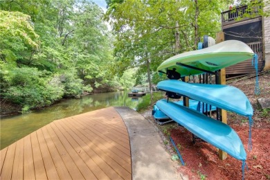PRICE IMPROVEMENT - WATERFRONT RETREAT - located in the Lake on The Highlands Course at Lake Arrowhead in Georgia - for sale on GolfHomes.com, golf home, golf lot