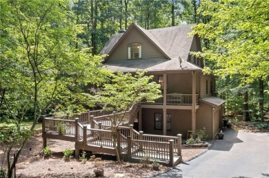 Nestled in a serene natural setting, this breathtaking 3-story on Big Canoe Golf Club - Cherokee in Georgia - for sale on GolfHomes.com, golf home, golf lot