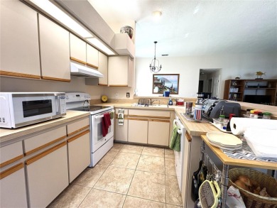 Move in ready, well-maintained home is just waiting for you on Rainbow Springs Golf and Country Club in Florida - for sale on GolfHomes.com, golf home, golf lot