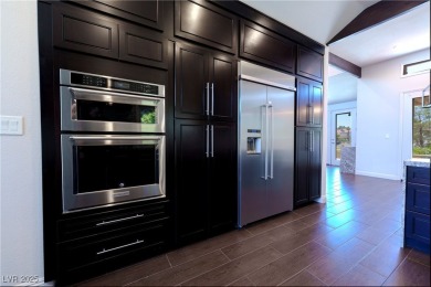 IMPRESSIVE TOTAL RENOVATIONS ON THIS 1 STORY (NO STEPS) GARDENS on Spanish Trail Golf and Country Club in Nevada - for sale on GolfHomes.com, golf home, golf lot