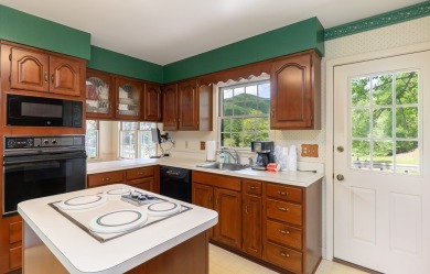 Lovingly maintained 2BR/2BA home with bonus room and extra-large on Mill Creek Country Club in North Carolina - for sale on GolfHomes.com, golf home, golf lot