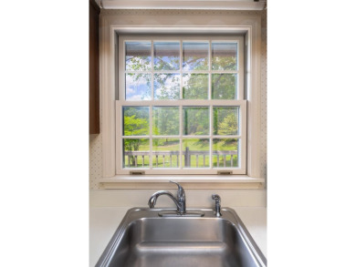 Lovingly maintained 2BR/2BA home with bonus room and extra-large on Mill Creek Country Club in North Carolina - for sale on GolfHomes.com, golf home, golf lot