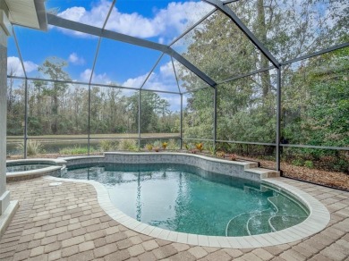 Welcome to this stunning single-level 4-bedroom, 3-bath POOL on Golf Club At North Hampton in Florida - for sale on GolfHomes.com, golf home, golf lot