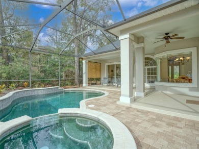 Welcome to this stunning single-level 4-bedroom, 3-bath POOL on Golf Club At North Hampton in Florida - for sale on GolfHomes.com, golf home, golf lot