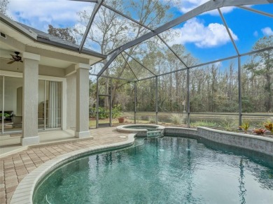 Welcome to this stunning single-level 4-bedroom, 3-bath POOL on Golf Club At North Hampton in Florida - for sale on GolfHomes.com, golf home, golf lot