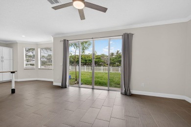 Discover this beautiful 5-bedroom, 2.5-bath home located in the on The Links At Madison Green in Florida - for sale on GolfHomes.com, golf home, golf lot