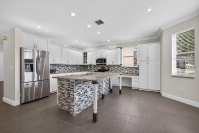 Discover this beautiful 5-bedroom, 2.5-bath home located in the on The Links At Madison Green in Florida - for sale on GolfHomes.com, golf home, golf lot