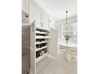 END UNIT 2 BR + DEN CONDO in Naples Heritage Golf and Country on  in Florida - for sale on GolfHomes.com, golf home, golf lot