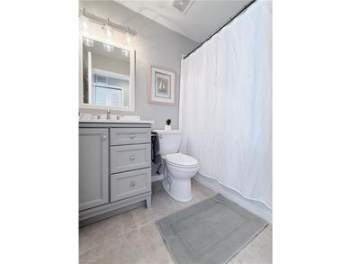 END UNIT 2 BR + DEN CONDO in Naples Heritage Golf and Country on  in Florida - for sale on GolfHomes.com, golf home, golf lot