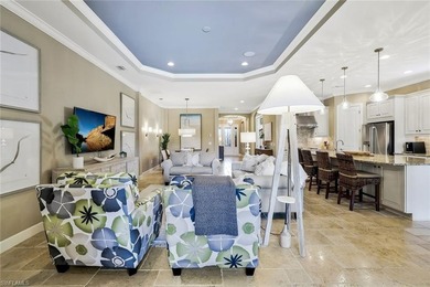 Enjoy captivating lake views from this impeccably turnkey with on The Rookery At Marco in Florida - for sale on GolfHomes.com, golf home, golf lot