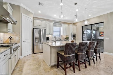 Enjoy captivating lake views from this impeccably turnkey with on The Rookery At Marco in Florida - for sale on GolfHomes.com, golf home, golf lot