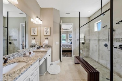 Enjoy captivating lake views from this impeccably turnkey with on The Rookery At Marco in Florida - for sale on GolfHomes.com, golf home, golf lot