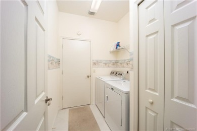 Discover the perfect blend of modern comfort and style in this on Eagle Marsh Golf Club in Florida - for sale on GolfHomes.com, golf home, golf lot