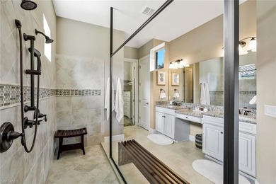 Enjoy captivating lake views from this impeccably turnkey with on The Rookery At Marco in Florida - for sale on GolfHomes.com, golf home, golf lot