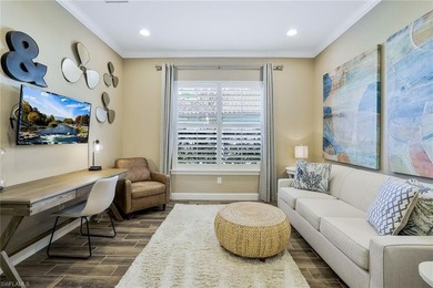 Enjoy captivating lake views from this impeccably turnkey with on The Rookery At Marco in Florida - for sale on GolfHomes.com, golf home, golf lot