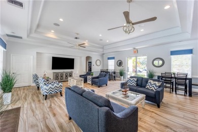 Discover the perfect blend of modern comfort and style in this on Eagle Marsh Golf Club in Florida - for sale on GolfHomes.com, golf home, golf lot