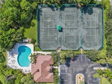 Discover the perfect blend of modern comfort and style in this on Eagle Marsh Golf Club in Florida - for sale on GolfHomes.com, golf home, golf lot