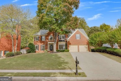 Welcome to this stunning home located in one of Woodstock's most on Towne Lake Hills Golf Club in Georgia - for sale on GolfHomes.com, golf home, golf lot