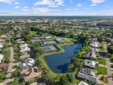 Built in 2022, this Concrete Block home with Metal Roof & Impact on Yacht and Country Club in Florida - for sale on GolfHomes.com, golf home, golf lot