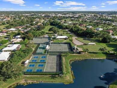 Built in 2022, this Concrete Block home with Metal Roof & Impact on Yacht and Country Club in Florida - for sale on GolfHomes.com, golf home, golf lot