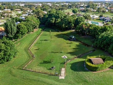 Built in 2022, this Concrete Block home with Metal Roof & Impact on Yacht and Country Club in Florida - for sale on GolfHomes.com, golf home, golf lot