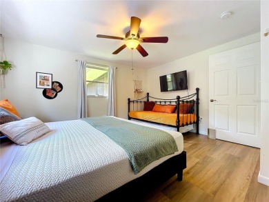 Welcome to The Retro River House -- a lovingly restored 1970s on Temple Terrace Golf and Country Club in Florida - for sale on GolfHomes.com, golf home, golf lot