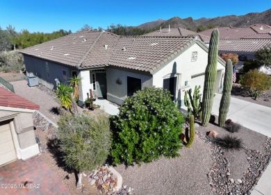 Popular Portland model home on the Fourth Hole of the Highlands on Heritage Highlands At Dove Mountain in Arizona - for sale on GolfHomes.com, golf home, golf lot